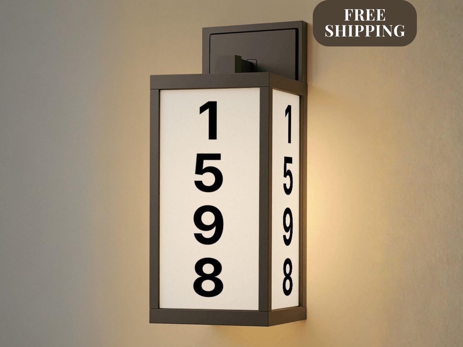 modern personalized address light with illuminated house numbers on front porch at night