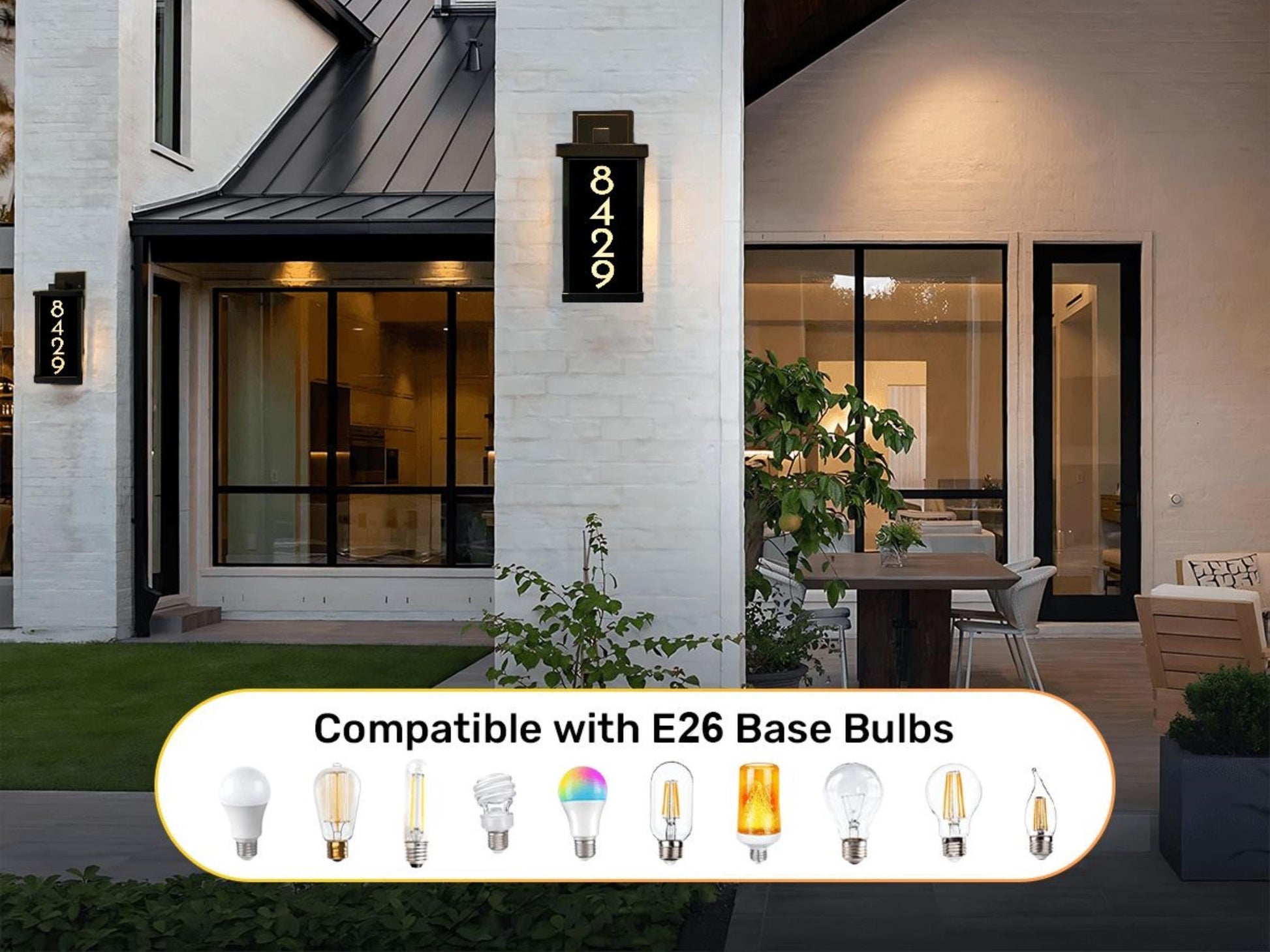 a modern house with a large window, a black awning, and a sign displaying the address "82499". The house has a patio area with a dining table and chairs. The image also includes various light fixtures, including a sign that says "Compatible with E26 Base Bulbs".