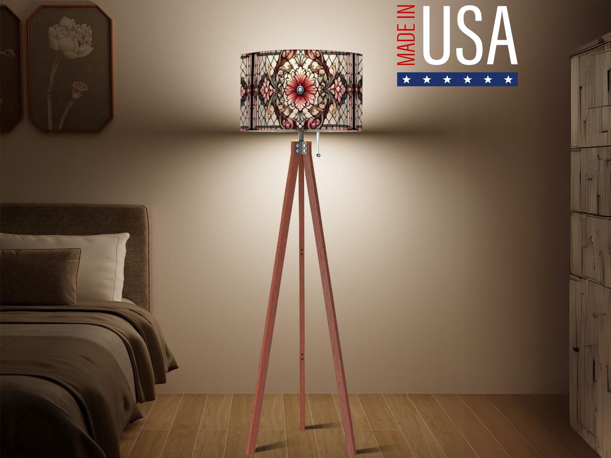 a modern bedroom with a wooden tripod floor lamp, a brown headboard, and a framed picture on the wall.